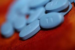 pilules médicales bleues bouchent arrière-plan impression grande taille de haute qualité photo