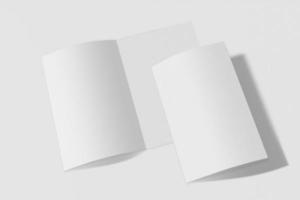 livret vertical de deux maquettes, brochure, invitation isolée sur fond blanc avec couverture souple et ombre réaliste. rendu 3d. photo