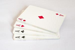 cartes à jouer a diamants, coeurs, trèfles, piques. photo