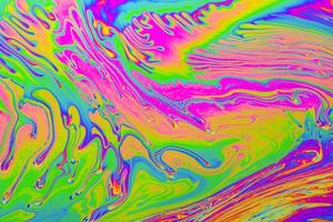 Résumé de fond multicolore psychédélique. couleurs arc-en-ciel. fond de motifs. photo macro shot de bulles de savon