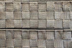 image d'une texture de tissu argenté tissée dans un carré. matériel de tissu pour les meubles photo