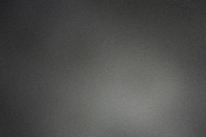 surface de tôle noire brossée, fond de texture abstraite photo