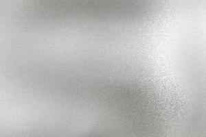 surface de paroi métallique en feuille d'argent brillant, fond de texture abstraite photo