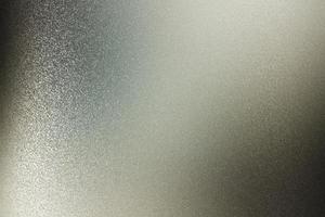 mur métallique noir rugueux brillant, fond de texture abstraite photo