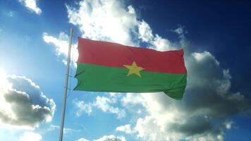 drapeau du burkina faso agitant au vent contre un beau ciel bleu. illustration 3d photo