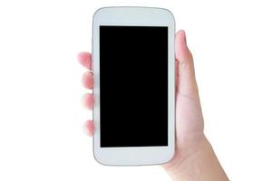 Main tenir le téléphone mobile isolé sur blanc photo