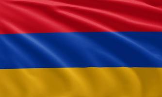 gros plan agitant le drapeau de l'arménie photo