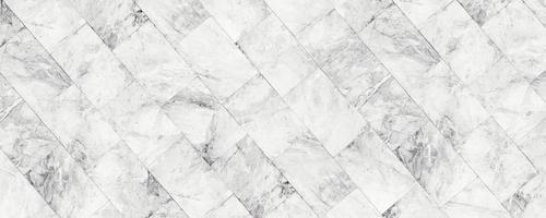 texture de pierre de marbre blanc panoramique pour le fond ou le design décoratif de carreaux de sol et de papier peint luxueux. photo