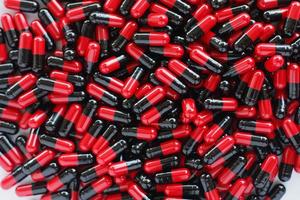 fond de capsules de pilules de nombreux médicaments photo