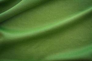 fond de texture de tissu vert froissé photo