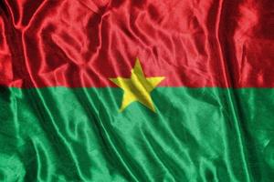 drapeau burkinabé drapeau en tissu drapeau satiné tissu texture du drapeau photo