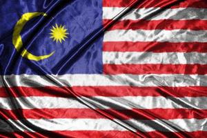 malaisie tissu drapeau satin drapeau agitant tissu texture du drapeau photo