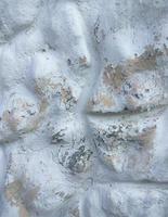 béton de pierre de texture de ciment blanc, mur de stuc plâtré de roche peint à plat fond pastel gris blanc grain de sol solide. photo