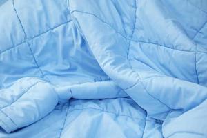 fond de couverture bleue sur le matelas photo