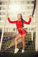 femme en tenue de sport posant photo