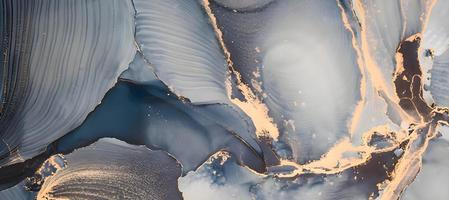 luxe naturel. le style incorpore les volutes du marbre ou les ondulations de l'agate. très belle peinture bleue avec ajout de poudre d'or. photo