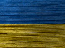 drapeau ukrainien peint. fond grungy de couleur bleu et jaune froissé photo