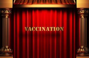 mot d'or de vaccination sur le rideau rouge photo