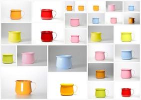 un ensemble coloré de tasses ou de tasses en zinc colorées. photo