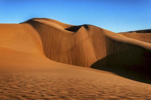 la mer de sable namib composée de nombreuses dunes de sable. photo