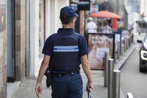 saint pol de leon, france, 7-22-21-femme policier photo