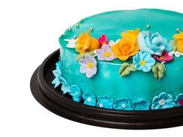 gros plan de décorations de gâteau à la confiture d'océan bleu avec des fruits glacés colorés photo