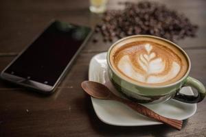 café latte art avec grain de café photo