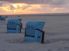 coucher de soleil sur la plage de juist photo