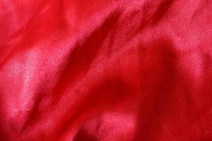 fond de texture de tissu rouge photo
