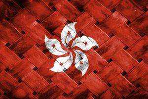 écran du drapeau de hong kong sur fond de bois d'osier photo