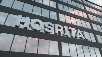 signe de l'hôpital sur un gratte-ciel de verre moderne. santé, clinique, urgence, soins de santé et concept médical. rendu 3d photo