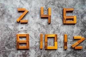 collection de conception de nombres en puzzle de bois photo