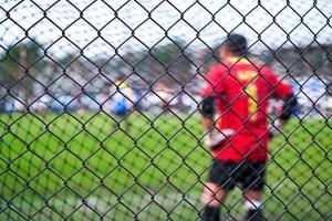 Filet de but de football avec arrière-plan flou photo