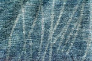 le jean bleu ou la texture propre du denim bleu. photo