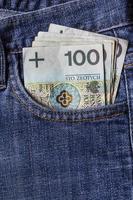 plusieurs poches de jeans de billets de banque polonais photo