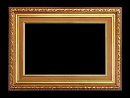 le cadre doré antique sur fond noir photo