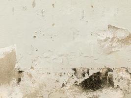 vieille texture de mur il y a des traces d'humidité provoquant un écaillage. il y a des taches de moisi. photo