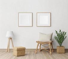 intérieur minimal de la pièce avec chaise en rotin, lampe, pot et plante, cadre photo vierge sur fond de mur blanc rendu 3d