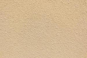 texture de mur marron clair, fond de ciment marron clair photo