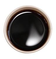 Vue de dessus d'une tasse de papier de café noir isolé sur fond blanc photo