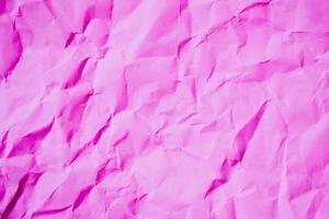fond de texture de papier rose froissé photo