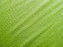 texture de jersey de tissu de vêtements de sport vert photo