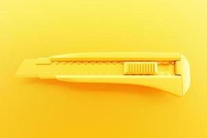 Illustration 3d d'un outil à main de coupe jaune isolé sur un fond monocrome. rendu 3d et illustration de l'outil de réparation et d'installation photo