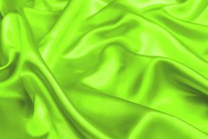 texture de tissu satiné vert ufo arrière-plan flou doux photo