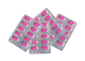 paquet de pilules roses. concept de pharmacie et de médecine photo