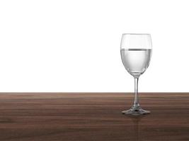 Verre à vin sur comptoir en bois isolé sur fond blanc photo