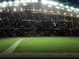 stade avec des fans le soir où le match célèbre le championnat photo