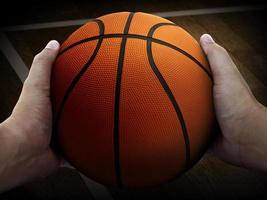 basket-ball et dribble à la main photo