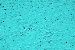 texture de mur ou de papier cyan-sarcelle, fond de surface de ciment abstrait, motif en béton, ciment peint photo