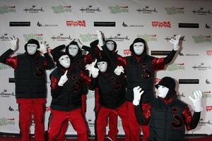 Los angeles, nov 27 - jabbawockeez arrive au défilé de noël hollywood 2011 à hollywood boulevard à sycamore le 27 novembre 2011 à los angeles, ca photo